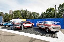 Jay Leno, left, and Walmart CEO John Furner revealed a one-off Ford F-150 Lightning built to honor late Walmart founder Sam Walton who drove a 1979 F-150 Custom shown on the right. Walton's actual truck remains on display at The Walmart Museum in Bentonville, Arkansas.