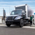 driving charging an electric Freightliner