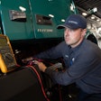 Technician checks a Volvo electric truck