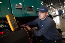 Technician checks a Volvo electric truck