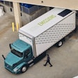 Volvo truck with zero emissions signage on trailer