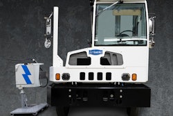 An Autocar terminal truck with a Rocsys hands-free charger