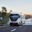 A Nikola semi truck driving on a highway