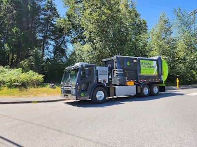Parked Emterra Environmental Mack LR Electric