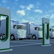 EV commercial trucks lined up for charging