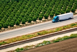 California truck driving by a farm