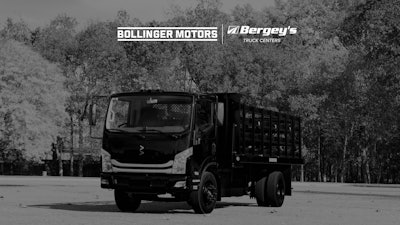A Bollinger B4 truck with the Bollinger Motors and Bergey's Truck Centers logos.