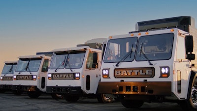 Battle Motors trucks in a row