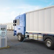 battery-electric semi truck at charging port