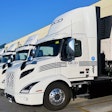 QCD's Volvo VNR Electrics parked