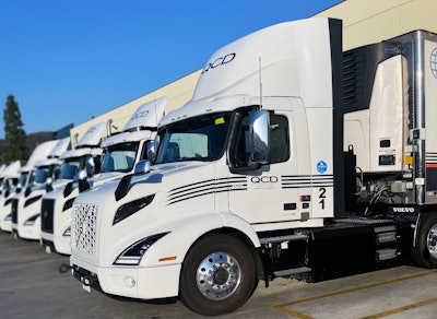 QCD's Volvo VNR Electrics parked