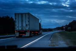 Truck on road with smoke