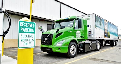 Electric truck charging at station
