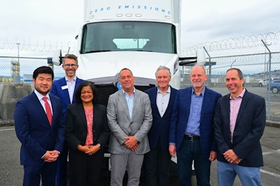 Zeem Solutions Founder and CEO Paul Gioupis (center) poses with NWSA officials.