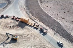 Diesel semis delivering the massive stamping press for the Tesla Semi at Nevada Gigafactory.