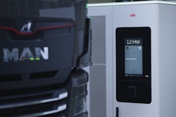 A battery-electric MAN truck connected to an ABB E-mobility 1.2 MW charging station.