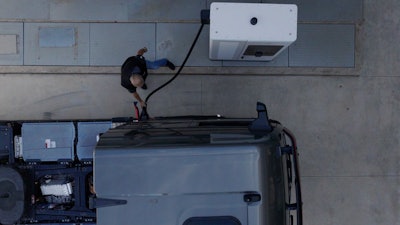 An example of a battery-electric MAN truck charging with an ABB E-mobility Megawatt charging system