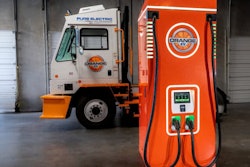 An Orange Juicer DC fast charger paired with an Orange EV terminal truck.