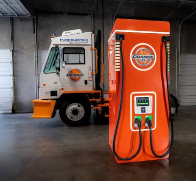 An Orange Juicer DC fast charger paired with an Orange EV terminal truck.