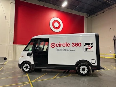 The Chevrolet BrightDrop EV last-mile delivery van on display at a Target warehouse.