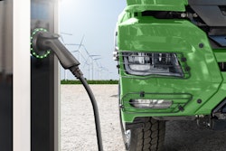 An example of a battery-electric semi truck receiving power at a charging station.