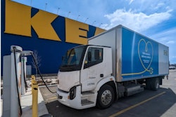 An IKEA Canada battery-electric delivery truck recharging outside a retail location.