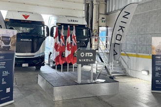 Hydrogen fuel cell and battery-electric semis, built by the now-bankrupt Nikola, parked inside a warehouse in July 2024 to mark the company's entry into the Canadian market.