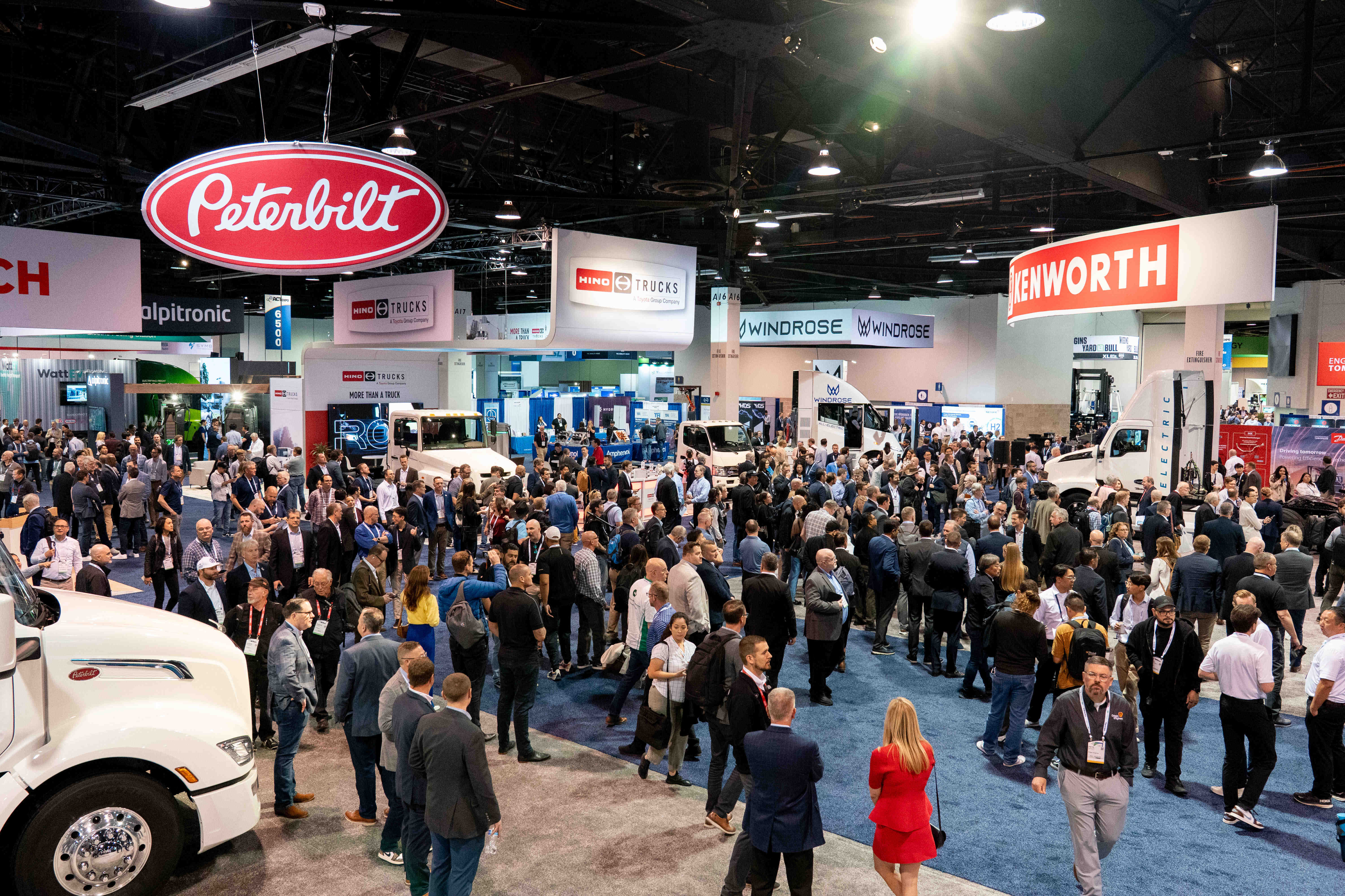 The showroom floor of the 2025 ACT Expo in Anaheim, Calif. featuring the Peterbilt and Kenworth displays.