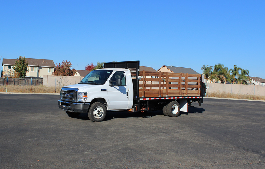 Motiv's stake bed truck sits parked between deliveries.
