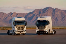 The Nikola BEV 2.0 (left) and Tre FCEV semi (right) parked outside for a publicity photo.