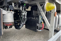 A detailed view of the Optimus Vector System manifold and fuel selector valves on a Hino truck, supporting 100% biodiesel operation in the Optimus–Mitsui partnership.
