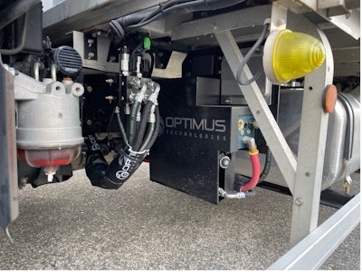 A detailed view of the Optimus Vector System manifold and fuel selector valves on a Hino truck, supporting 100% biodiesel operation in the Optimus–Mitsui partnership.
