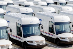 Examples of newly-manufactured Oshkosh Next Generation Delivery Vehicles (NGDV) parked in a USPS parking lot.