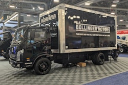 A black Bollinger B4 battery-electric Class 4 truck on display at ACT 2024.