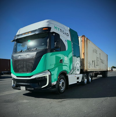 A Nikola Tre FCEV semi that's been repainted with Hyroad Energy livery.