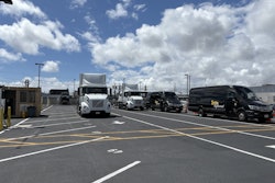 Zeem Solutions' LAX depot, featuring parked Volvo VNR Electric Class 8 semis and Mercedes-Benz eSprinter vans.