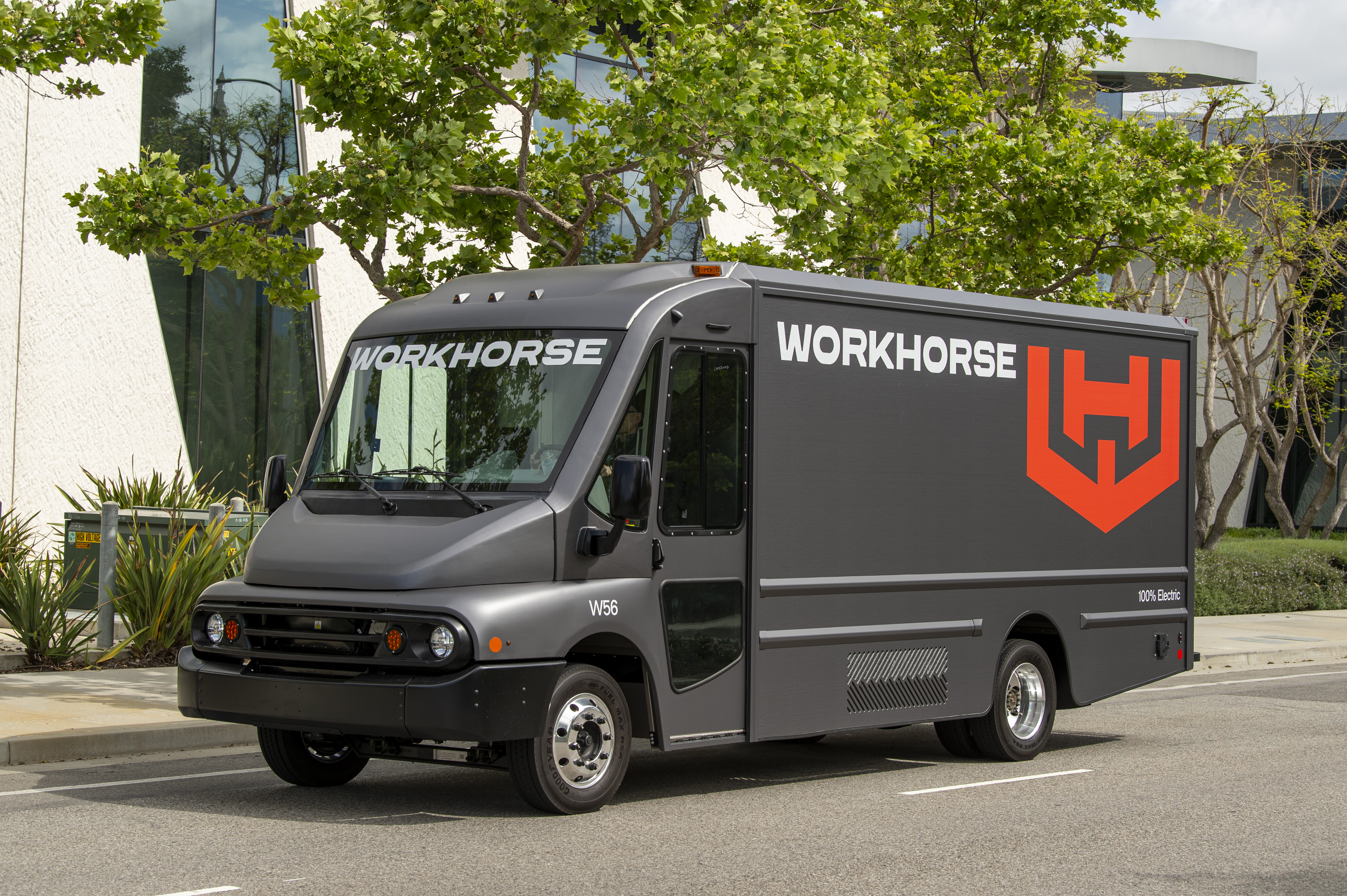 The new and more affordable 140 kWh battery-electric Workhorse W56 battery-electric step van parked on a street.