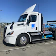A Freightliner eCascadia truck from PG&E's fleet is shown charging at an ABB eMobility charger.