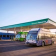 Three public transit buses refueling at a renewable natural gas (RNG) station.