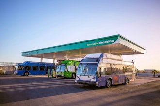 Three public transit buses refueling at a renewable natural gas (RNG) station.