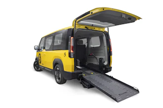 A rear three-quarter view of the PV5 WAV New York Taxi and Rideshare concept.