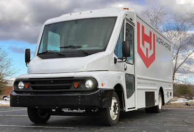 A Workhorse Group W56 battery-electric step van with the company's logo parked in an outdoor lot.