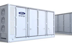 A display of Ford Energy battery storage containers and industrial power modules.