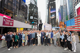 A large group of Einride employees gather in Times Square to celebrate the company's Nasdaq debut.