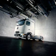 Mercedes-Benz eActros Lowliner showcased in a warehouse.