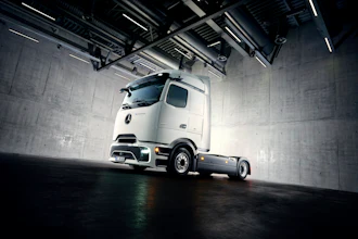 Mercedes-Benz eActros Lowliner showcased in a warehouse.