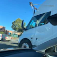A white Tesla Semi equipped with self-driving hardware undergoing public road testing in California.