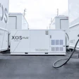 The standard Xos Power Hub connected to two battery-electric commercial vehicles.